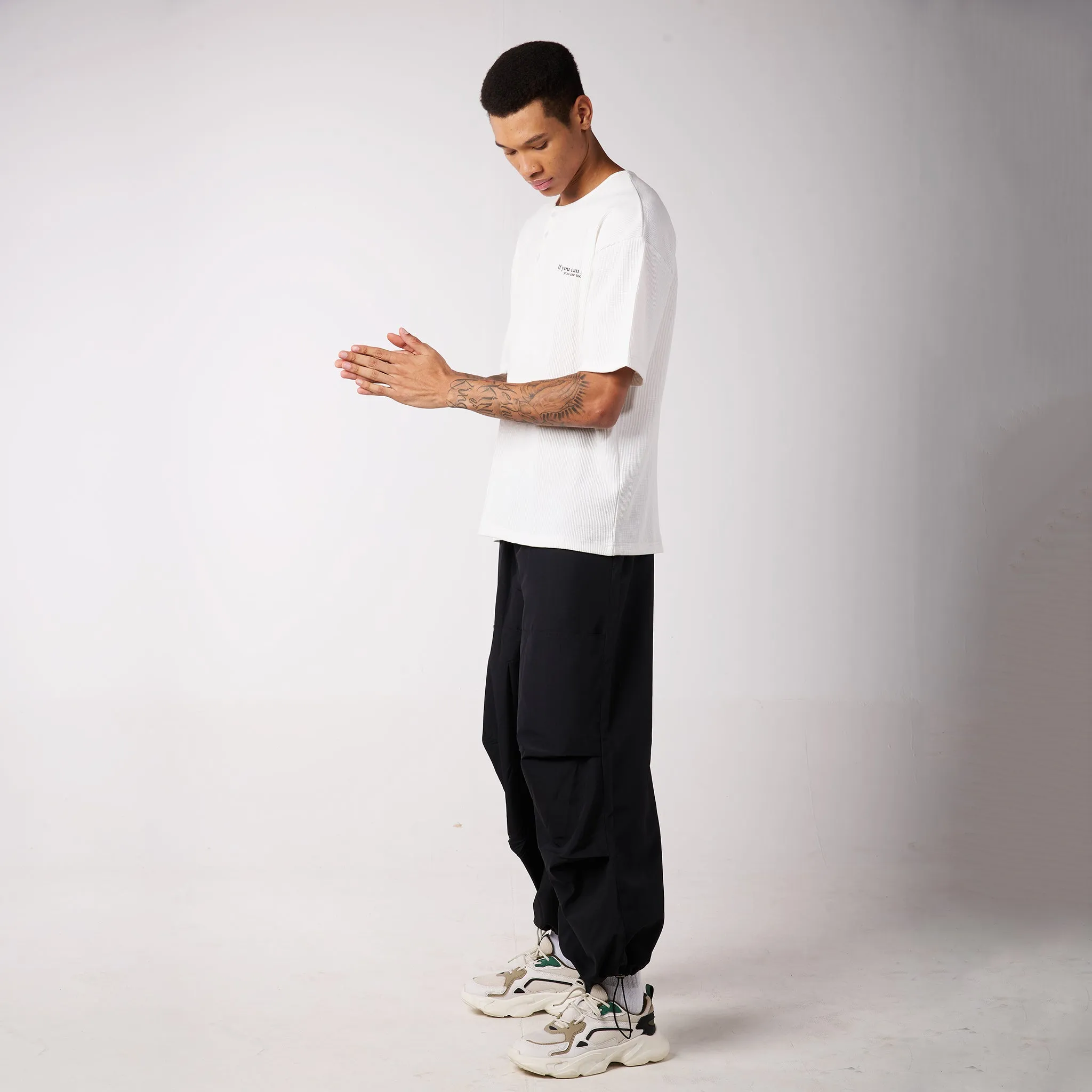 Black Air Parachute Pants & White Textured knit Tee Set for Men