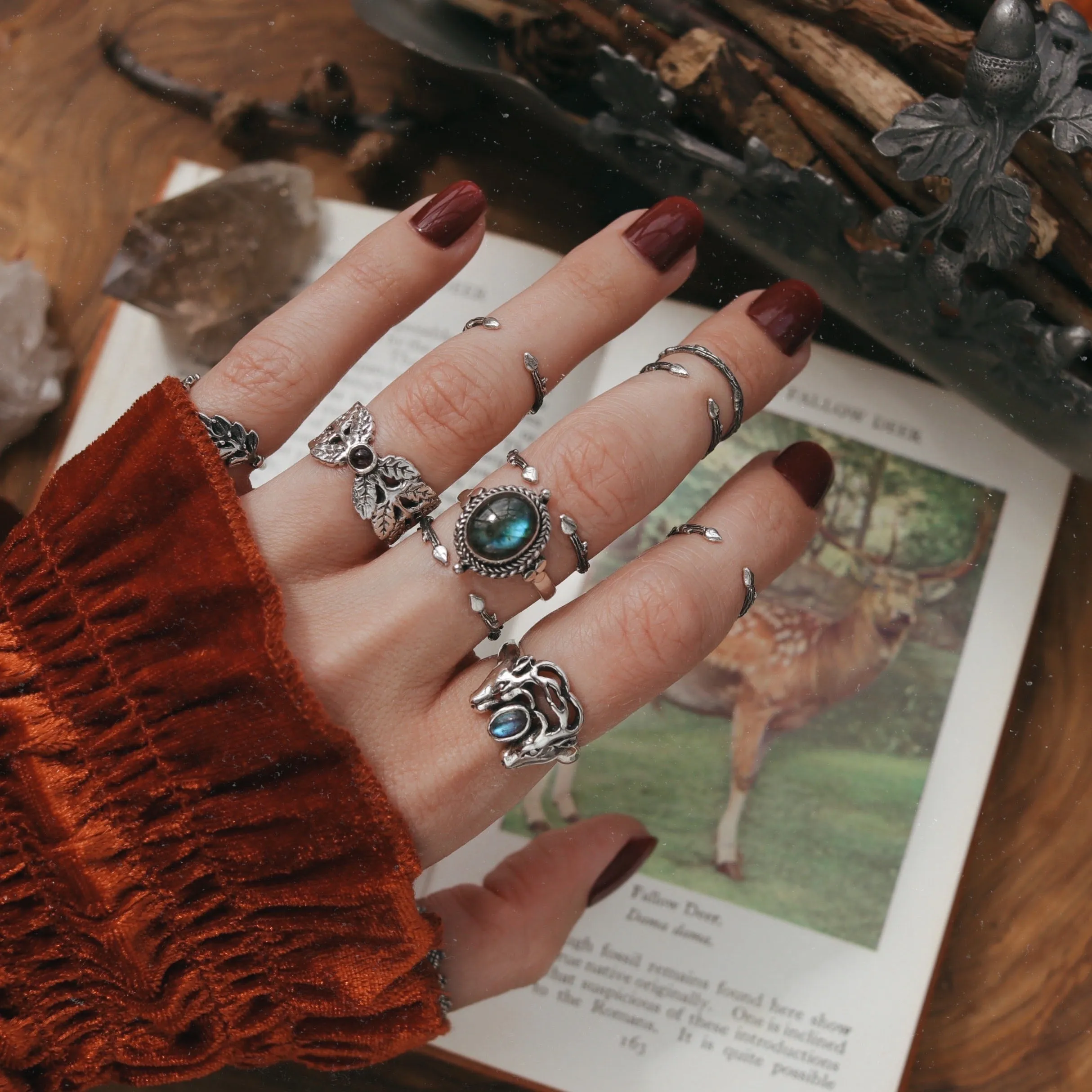 Fern Cradle Garnet Ring