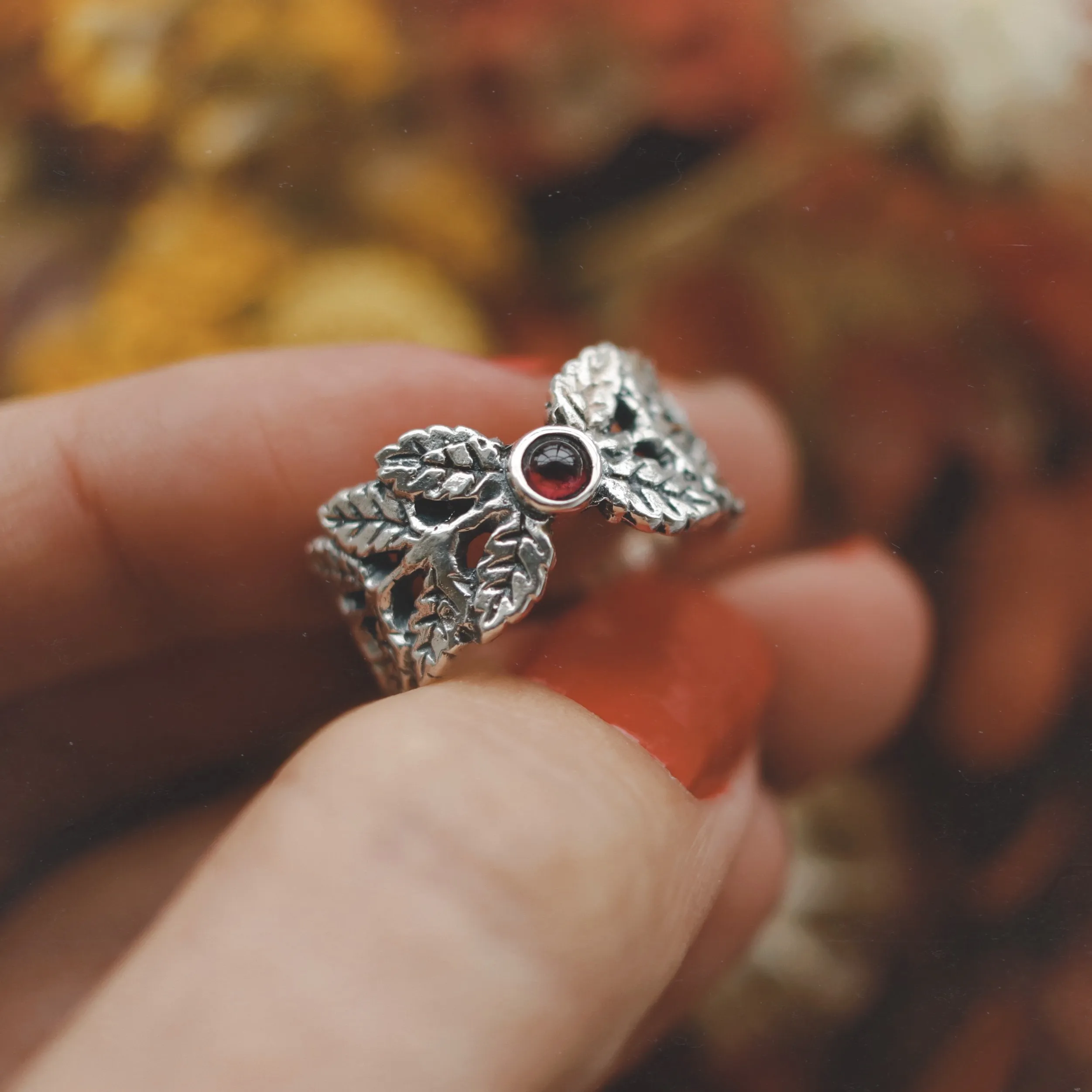 Fern Cradle Garnet Ring